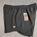 New Balance  Women’s Core Woven Shorts Photo 1