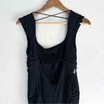 Free People  Movement Pirouette Black Jumpsuit Open Back Flare Leg Medium Photo 5