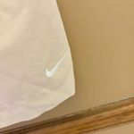 Nike Cropped Flowy Embroidered Swoosh Active Tank Tan Beige large Photo 3