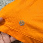 Lululemon Women’s Ultralight Waist-Length Tank Top Sleeveleee in Orange Size 2 Photo 8