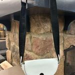 Kendall + Kylie Black and White Crossbody Bag with Semi-Circular Design Photo 0