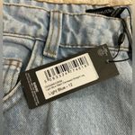 Pretty Little Thing PLT light blue wash distressed straight leg Photo 1
