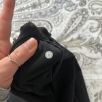 Lululemon Black and Gold Limited Edition 21” Leggings Size 6 Photo 3