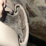 Commense Plain Detailed Dumpling Bag Tan Photo 2