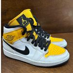 Nike  Air Jordan 1 Mid Perforated White University Gold Sneaker Women 9 Colorful Photo 0