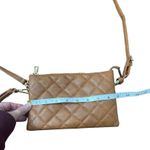 Brown quilted leather crossbody bag Photo 1