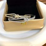 Boutique Women's 18k Gold Plated Knot Bling Simulated Diamond Cuff Bracelet, ‎ Adjustable Photo 2