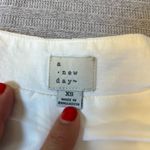 A New Day Cream Sleeveless Blazer Photo 1