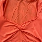 Aritzia  Babaton Long Sleeve Twist Orange Top Photo 1