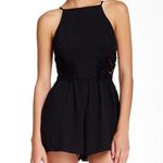 Love...Ady Black Romper High Neck Lace Cut Out Floral Side Photo 0