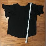 Ann Taylor - Black ruffled shoulders‎ short sleeve blouse 
Size M Photo 4