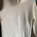 The Comfy  cozy cream ladies size large turtleneck Photo 1