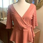E & M A Beautiful faux wrap top! Photo 0