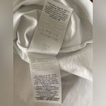 Ganni  White Tee with Blue and Pink Design

"Excellent Preowned
Condition" Photo 9