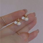 Gold Starfish and Shell Earrings Photo 3