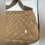 FP MOVEMENT RUN ABOUT SLING BAG Tan Photo 1