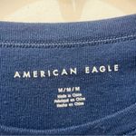 American Eagle  Womens Graphic Baby Tee Size Medium Navy Blue sunflower Photo 1