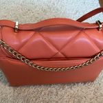 A New Day  Coral purse with Gold embellishments, horseshoe clip close. Photo 1