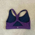 Athleta  purple sports bra in size small Photo 1