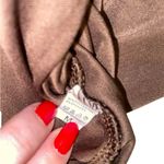 brown cropped long sleeve going out top with cut out Size M Photo 4