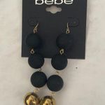 Bebe New  Black & Gold Ball Swinging earrings Photo 0