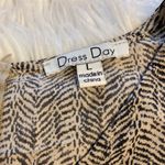 Dress Day Romper size L long 27” bust 36” excellent condition tan & black color Size L Photo 7