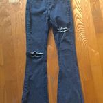 Princess Polly Distressed Flare Jeans Stretchy Photo 0