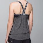 Lululemon  Rest Less Tank in Heathered Black and Flowabunga Black Angel Wing. Photo 2