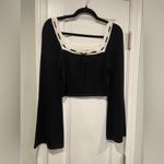 Dee Elly NWOT  Size M Black Cream Bell Sleeve Knit Crop Top Bow Scalloped Trim Photo 1