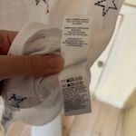 Lucky Brand  NWT Women's White Twist Front Red Blue Embroidered Stars Knit Top M Photo 4