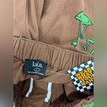 Dressed in lala Brown Wide Photo 1