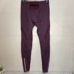 Mizuno  purple Womens running leggings with reflective zippers Photo 2