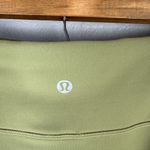 Lululemon  Invigorate High-Rise Tight 25" Size 10 Bronze Green Side Pockets Photo 3