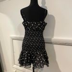 The East Order Black and white floral and polka dot print dress. brand is  size M Photo 4
