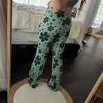 Urban Outfitters  Women’s Extra Small Bryn Floral Green Pull On Flare Pants Photo 1