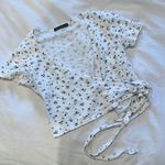 Brandy Melville MOVING SALE -  Blue floral print wrap tshirt crop top Photo 3