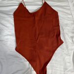 Burnt Orange Bodysuit Size M Photo 0