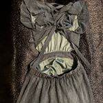 Altar'd State flowy, A-line maxi dress with a tiered skirt and a deep V-neckline or open-back design. Photo 8