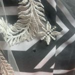 Allure Bridal  Wedding Dress Style; F239 Andi Was altered to fit me at 5’2. The dress does have a few small tears in the train which are pictured. A bustle was added to the dress the train can be tied up. Any extra fabric from being altered was also saved. Photo 11