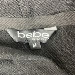 Bebe  Black Long Sleeve Logo Print Hoodie Cropped Sweater Top M Photo 3