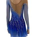 Reveal Dazzle in this blue sarong with shimmering rhinestones. Ideal for beach elegance. Photo 1