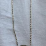 Kendra Scott Black And Gold Necklace Photo 0