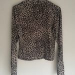 Olivia Rae Leopard Print Turtleneck Photo 1
