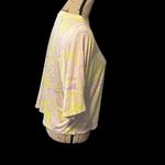 Fabletics  flourescent yellow and purple swirls on a cream tee. NWOT. Photo 1