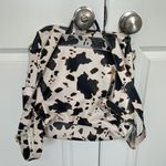 Faux leather fun Cow Print Backpack with colorful strap Photo 1