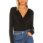 Free People  Turnt Bodysuit in Black Size Small Long Sleeve Revolve Photo 0