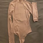 Garage Bodysuits Photo 0