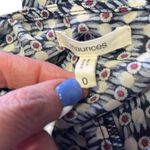 Maurice's Stylish Blue, Red and White Wrap Blouse with zipper pocket accents. Photo 6