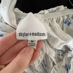 Skylar + Madison  Floral Wrap Top Photo 3