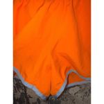Nike  Women’s Dri Fit Running Shorts, size XL orange blue Photo 1